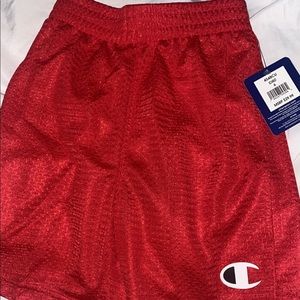 Kids Champion red shorts size 6.